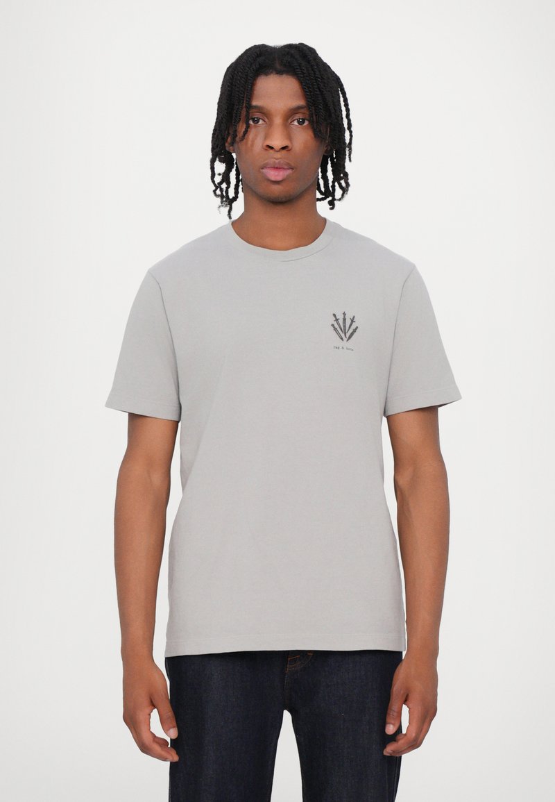 Gray cotton t-shirt with short sleeves. Features a small black graphic on the left chest depicting three arrows. Round neckline.
