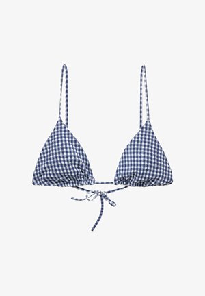 Haut de bikini en vichy bleu marine et blanc avec des bonnets triangulaires, des bretelles spaghetti réglables et une fermeture à nouer dans le dos. Texture en mélange de coton.