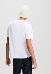 Karl Lagerfeld Jeans KARL PRINT - Apdrukāts T-krekls - white