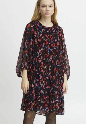 Black pleated dress with a multicolored abstract pattern, long balloon sleeves, and a round neckline. Sheer fabric and knee-length design.