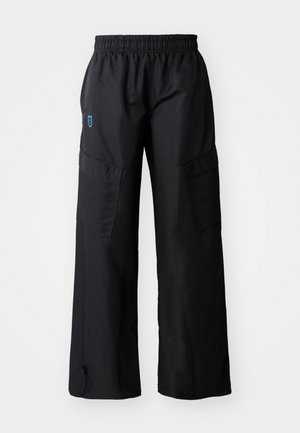 Black cargo pants with an elastic waistband, two large side pockets, and zippers at the ankles. Made of lightweight fabric.