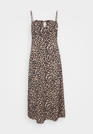 Leopard print maxi dress with spaghetti straps, featuring a keyhole detail at the bust. Made of soft fabric with a flowing silhouette.