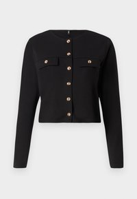 Schwarze, kurz geschnittene Jacke mit langen Ärmeln, rundem Ausschnitt, goldfarbenen Knöpfen und zwei vorderen Taschen mit Klappenverschluss. Glatte Stoffstruktur.