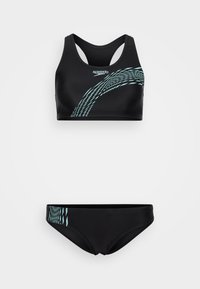 Zwart bikini set met een racerback top met een turquoise golfpatroon en bijpassende bottoms, gemaakt van glad, rekbaar zwemmateriaal.