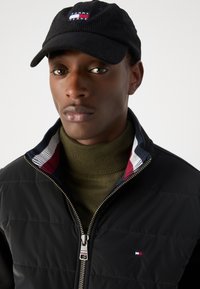 Tommy Hilfiger MIX MEDIA ZIP - Light jacket - black