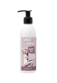 Bottiglia di plastica bianca con un tappo a pompa, caratterizzata da un'etichetta rosa. Titolo "Ambra & Gelsomino." Contiene un'illustrazione e testo in italiano.