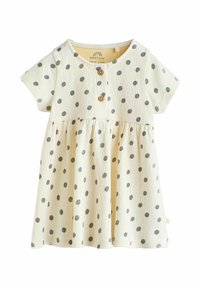 Robe jaune clair à manches courtes, ornée de pois gris, avec un détail de boutons au niveau de la poitrine et une jupe évasée en tissu texturé.