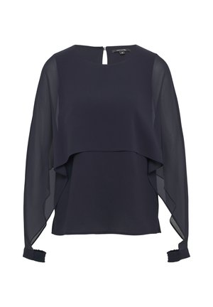 Marinebluse mit transparenter Überlagerung, rundem Ausschnitt und Schlüsselloch-Rücken. Lange Ärmel mit gerafften Manschetten und geschichtetem Design. Glatte Textur.