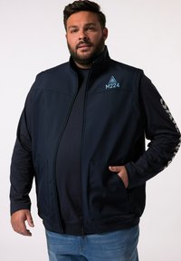 Navy-zipperjacke aus weichem Stoff mit Kragen-Design, featuring ein blaues Logo auf der Brust und seitlichen Taschen. Lässige Passform mit langen Ärmeln.