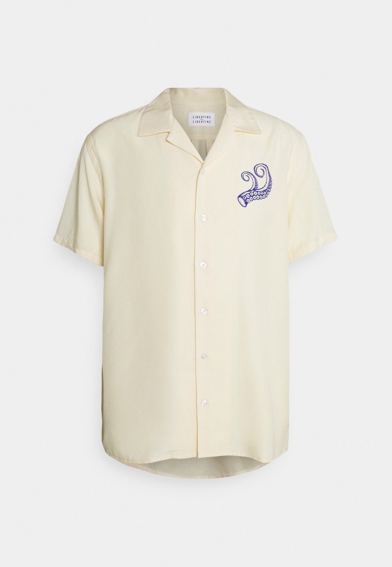 Kortärmad gul skjorta i lätt tyg med en blå bläckfisk broderad på vänster bröst och knäppning fram.