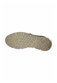 Suela de zapato deportivo en beige con goma texturizada, que presenta un patrón ondulado con motas de color. Bordes reforzados para mayor durabilidad.
