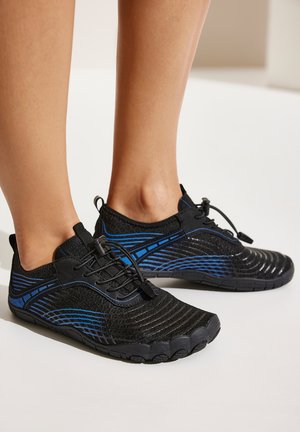 Black lightweight shoes with a textured pattern and blue accents. Features a lace system for a secure fit and a flexible sole with individual toe sections.