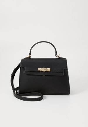 Sac à main en cuir noir avec un design structuré, une poignée supérieure, une bandoulière amovible et des accessoires en métal doré. Il dispose d'une fermeture à l'avant avec un fermoir.