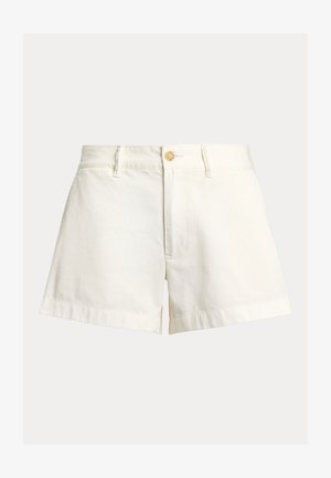 Valged puuvillased lühikesed püksid lahtise lõikega, millel on nööpkinnitusega sulguv eest, sirged sääred ja ülespööratud ääred. Lihtne disain ilma mustrite või kaunistusteta.