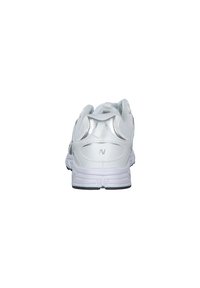 White synthetic athletic shoe with a mesh upper, padded collar, and rear pull tab; features a contrasting rubber sole and logo detail.