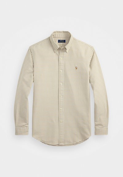 Langermet skjorte med knapper i beige og brunt rutemønster, med en klassisk krage og lite logo, laget av vevd stoff.