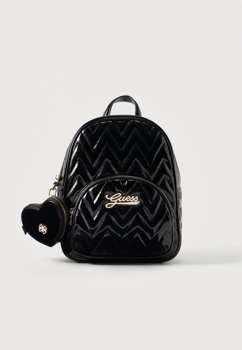 guess detailed mini backpack Factory Evan Color-Block Crossbody size silhouette and features an allover logo print Guess | Bags | Guess