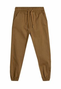 Brune joggerbukser lavet af blødt stof, med elastisk talje og snor, sidelommer og tapered ankler.