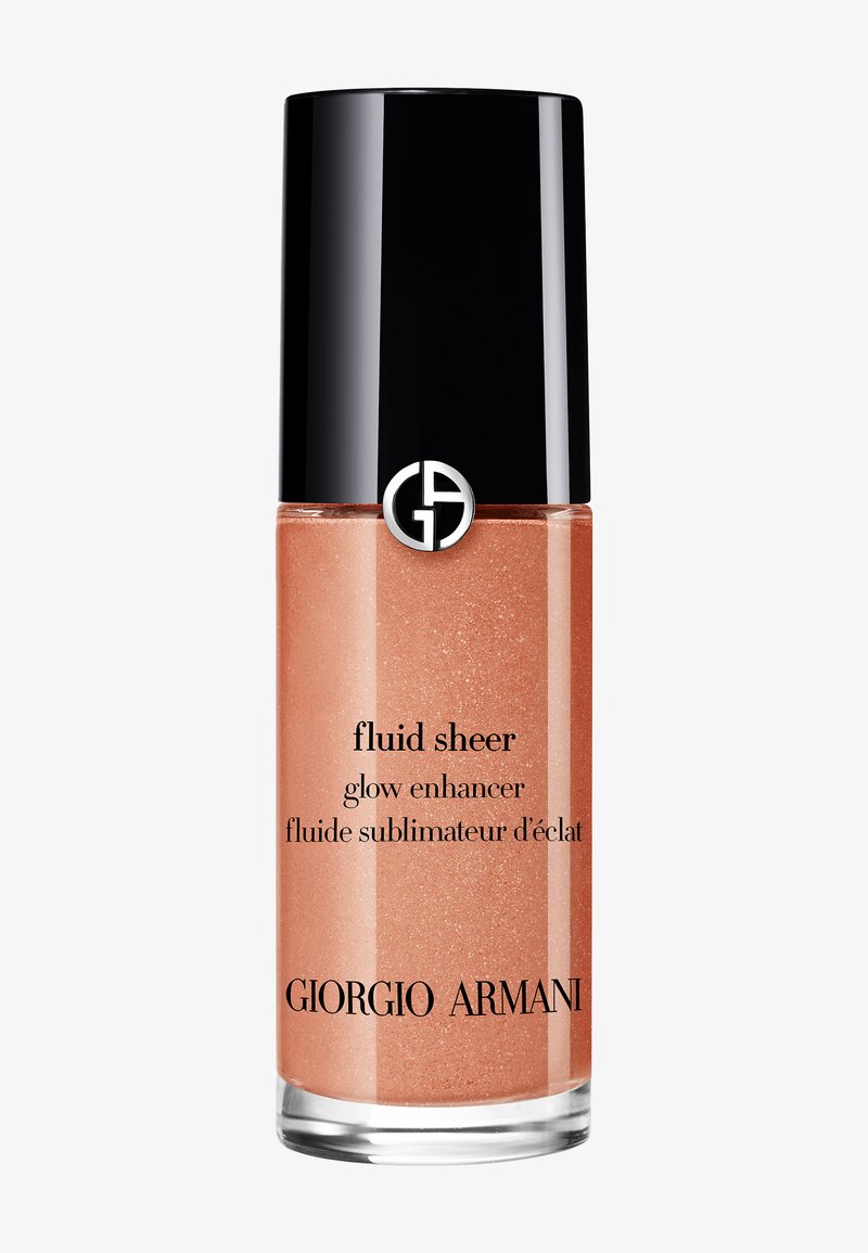 Giorgio Armani Fluid Sheer i en gjennomsiktig glassflaske fylt med en ferskenfarget væske. Svart hette med logo og svart skrifttype etikett.