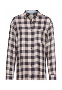 Chemise à manches longues boutonnée avec un grand motif à carreaux noir et blanc et une poche poitrine unique.