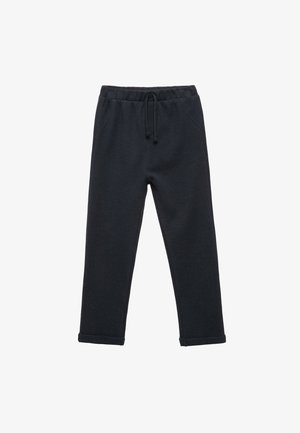 Zwarte sweatpants van gestructureerde stof, met een elastische tailleband met een trekkoord, zijzakken en taps toelopende broekspijpen.