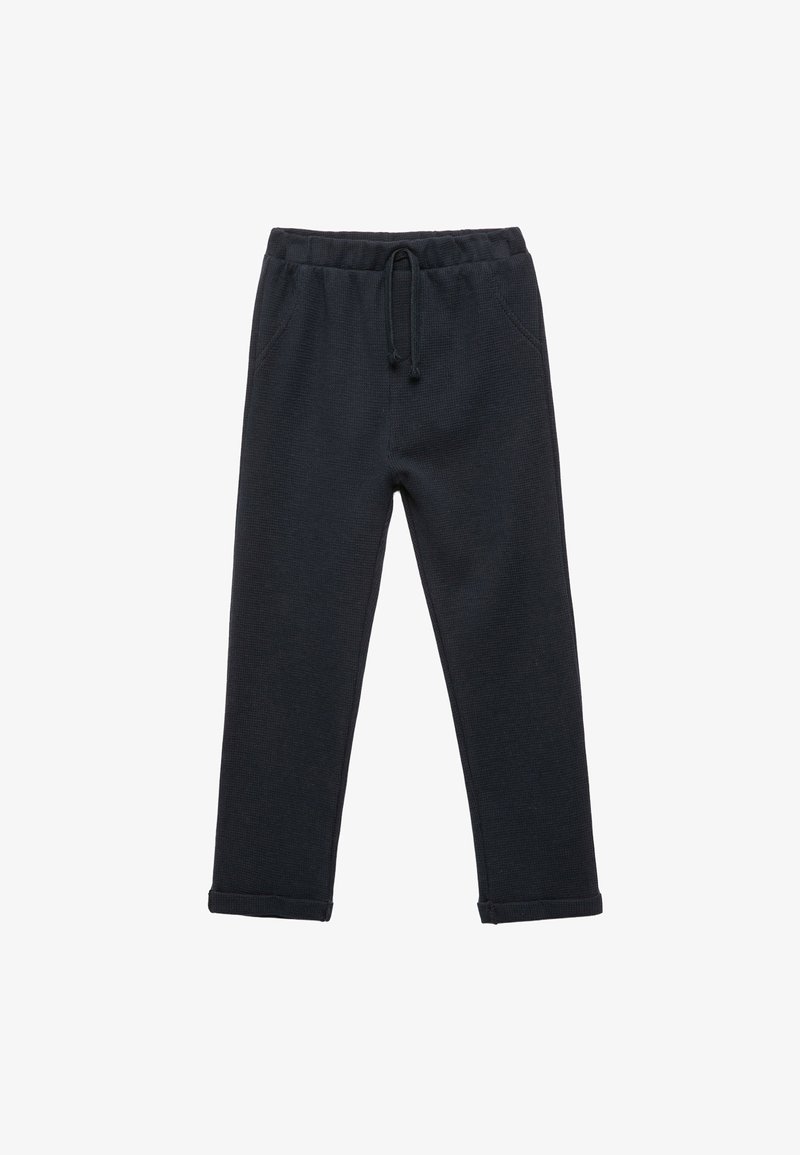 Sorte svedbukser lavet af tekstureret stof, med en elastisk talje med snor, sidelommer og tapered ben.