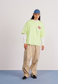 Alpha Industries CANDY CREW - Marškinėliai su spaudiniu - arctic lime