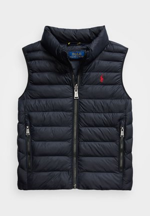 Navy puffer vest with high collar, zip front, two side pockets, horizontal quilted texture, and embroidered logo on the left chest.