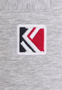Karl Kani Teplákové kalhoty - grey