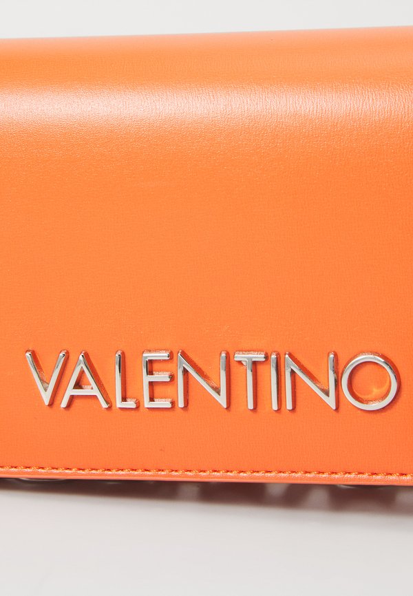 STEFANY - Cross body bag - arancio
