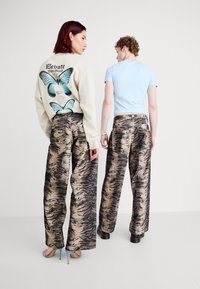 Jaded London TIGER COLOSSUS UNISEX - Traperice opuštenog kroja - brown