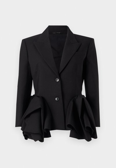 Black blazer featuring a structured silhouette, prominent ruffled accents at the waist, two buttons, and a notch lapel design.