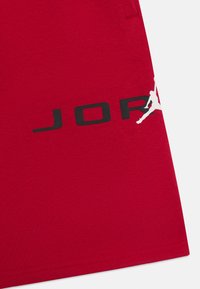 Jordan BASELINE - Jogginghose - gym red