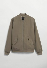 Bomber jacket in olive green, featuring a front zip closure, side pockets, ribbed cuffs, and a smooth, matte texture.