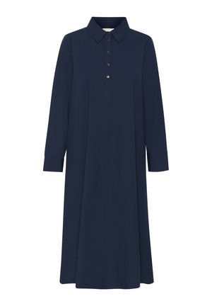 Rochie de culoare albastru marin, cu guler, mâneci lungi și închidere cu nasturi. Construită dintr-un material moale, cu o siluetă lejeră și fluidă, fără modele.