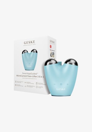 Blauw GESKE MicroCurrent Face-Lifter apparaat met twee zilveren bollen naast de witte productdoos met prijslogo's en belangrijkste kenmerken.