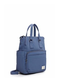 Blue, textured backpack with dual handles, zipper, front pocket, and adjustable shoulder strap. Features a small logo label on the front.