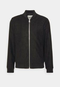 Black suede bomber jacket with a ribbed collar and cuffs, featuring a central silver zipper and no external pockets. Smooth texture.