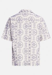 Short-sleeve shirt with a cream background and blue patterned design featuring intricate geometric shapes and floral accents.