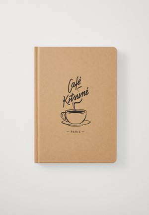 Brown hardcover notebook featuring a black outline illustration of a coffee cup and "Café Kitsuné Paris" text on the cover.
