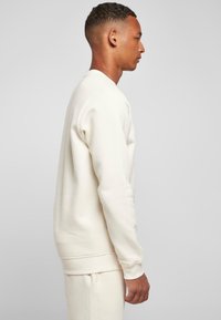 Starter ESSENTIAL CREWNECK - Sweatshirt - palewhite