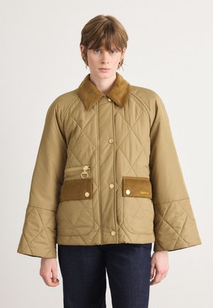Veste matelassée couleur khaki avec un col en velours côtelé, des accessoires dorés, une poche zippée et deux poches avant à accents en velours côtelé.