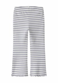 Legginsy w biało-fioletowe paski, z prążkowaną fakturą i rozkloszowanym krojem z falbanką na dole.