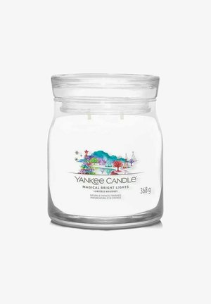 Yankee Candle i et klart glasburk med et farverigt design af træer og stjerner. Rummer 368 g af naturlig og syntetisk duft.
