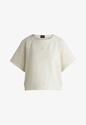 Light beige short-sleeve sweatshirt with a crew neckline and embroidered logo on the front. Smooth fabric with a slightly relaxed fit.