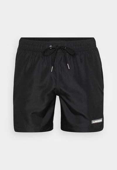 Juodi maudymosi šortai su elastingu juosmeniu, raišteliu ir sidabrinėmis detalėmis. Pasiruošę su logotipo užrašas apatinėje pusėje.