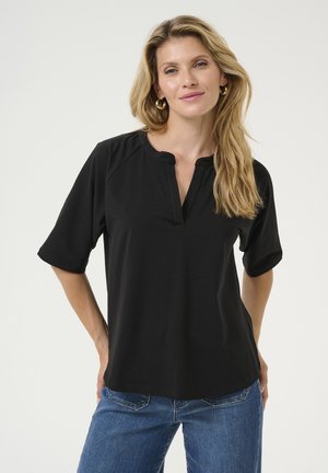 Black short-sleeve top featuring a round neck with a partial placket. Made of smooth fabric, it has a relaxed fit and slight shaping at the sides.