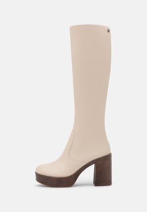 High heeled boots - beige