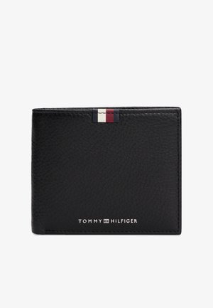 Schwarze, strukturierte Lederbrieftasche mit Tommy Hilfiger Logo und einem kleinen rot-weiß-blauen Stoffetikett oben in der Mitte.