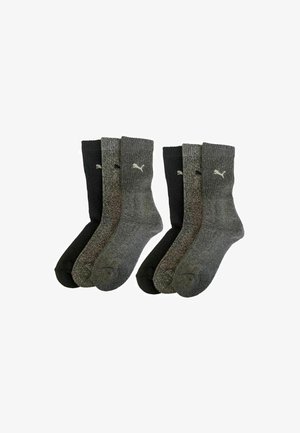 Set of four ankle socks in black and shades of gray. Made from a textured material, featuring the Puma logo in white on the side.